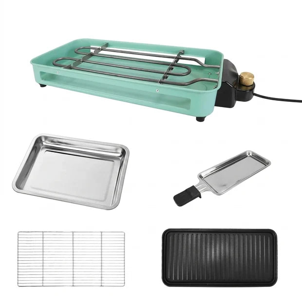 A multi-functional electric grill with a black griddle surface, a wire upper rack for skewers and kebabs, and three detachable stainless steel pans with black handles containing cooked food, shown on a white background.